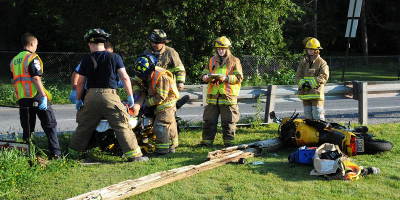 Motorcycle accident on Wednesday, July 15, at Fickes Rd & Carlisle Rd.  One person to the hospital.  photo by Curt Werner
