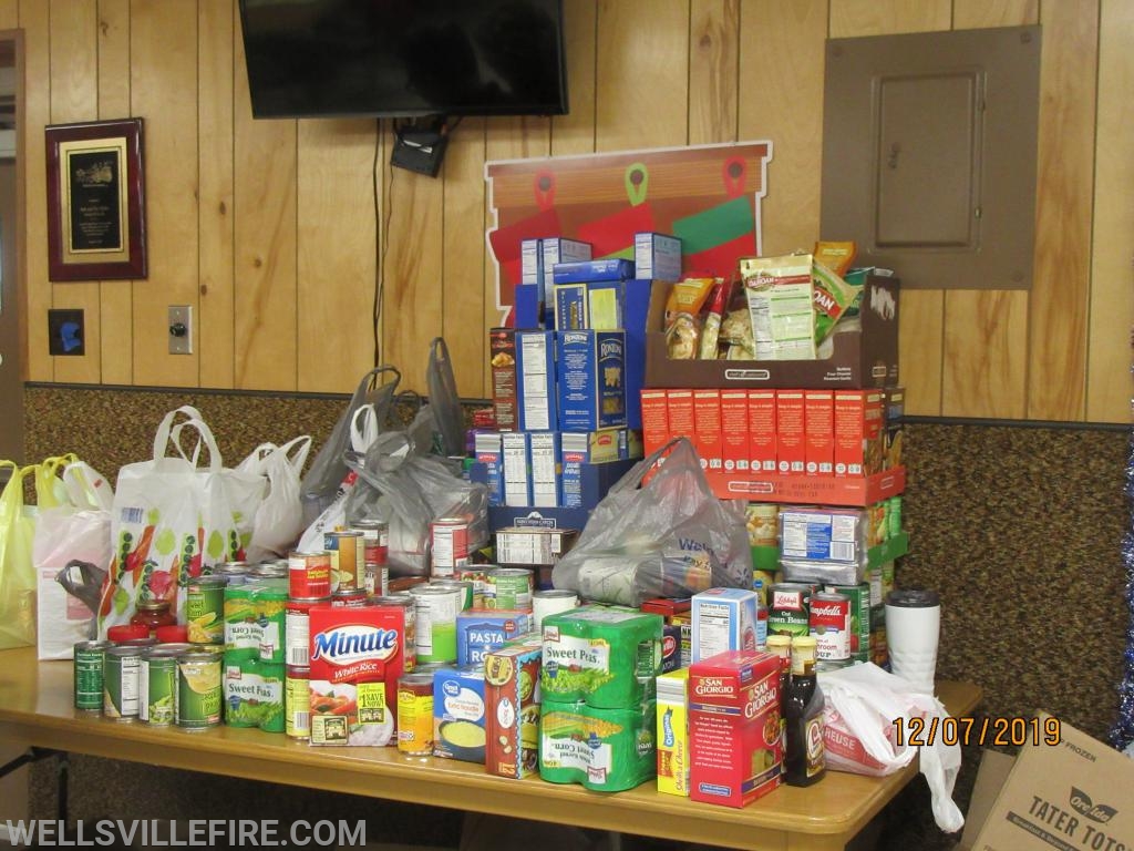 Donations for local families - Breakfast with Santa 2019 - Photo by Stacy Shank