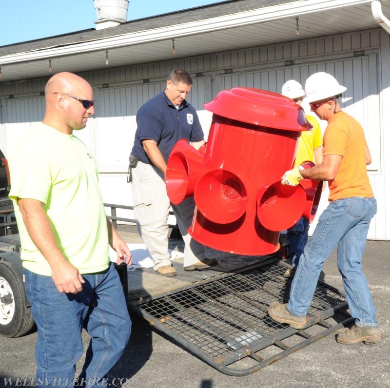 Re-conditioned siren placed back on pole, 07/20/16.  photos by Curt Werner